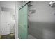 Modern bathroom with tiled walk-in shower and updated fixtures at 801 83Rd N Ave # 412, St Petersburg, FL 33702