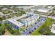 Aerial view of the condo building showing the layout, landscaping and parking areas at 801 83Rd N Ave # 412, St Petersburg, FL 33702