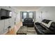 Bright living room with hardwood floors, modern furnishings and plenty of natural light at 801 83Rd N Ave # 412, St Petersburg, FL 33702