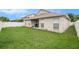 A spacious, well-manicured backyard offering privacy and an inviting outdoor space at 8104 Abbey Mist Cv, Tampa, FL 33619