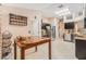 Bright kitchen features stainless steel appliances, tile floors, and dark wood cabinetry at 8104 Abbey Mist Cv, Tampa, FL 33619