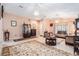 Inviting living room featuring tile floors, stylish decor, and natural lighting at 8104 Abbey Mist Cv, Tampa, FL 33619