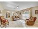 Inviting living room with tiled floors, archways, and plenty of space for relaxation and entertainment at 10437 River Bream Dr, Riverview, FL 33569