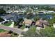 A waterfront property featuring well-maintained lawns, private docks, and access to stunning water views at 10729 Drummond Rd, Tampa, FL 33615