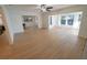 Spacious living area with an open floor plan, hardwood floors, and ample natural light at 10729 Drummond Rd, Tampa, FL 33615