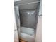 Modern tub/shower combination with gray granite tile and chrome fixtures at 10729 Drummond Rd, Tampa, FL 33615
