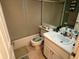 Standard bathroom with a shower and neutral-toned vanity at 110 Lakeside Ct # 110, Oldsmar, FL 34677