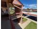 View of the building complex from the balcony showcasing covered parking spots at 110 Lakeside Ct # 110, Oldsmar, FL 34677