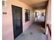 Condo hallway featuring unit number, exterior lighting, and exterior view at 110 Lakeside Ct # 110, Oldsmar, FL 34677