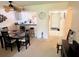 Inviting dining and kitchen area leading to a comfortable living space at 110 Lakeside Ct # 110, Oldsmar, FL 34677