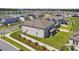 Expansive backyard with privacy fence, lush lawn, and covered patio, offering a serene outdoor living space at 11002 Sundrift Dr, Tampa, FL 33647