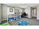 A playful bedroom with a bunk bed and sports themed rug at 11002 Sundrift Dr, Tampa, FL 33647