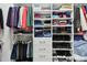 Organized walk-in closet with shelving, hanging rods, and drawers provides ample storage space at 11002 Sundrift Dr, Tampa, FL 33647