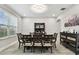 Dining area featuring a decorative chandelier and a spacious layout at 11002 Sundrift Dr, Tampa, FL 33647