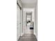 Hallway with access to bedroom and bathroom at 11002 Sundrift Dr, Tampa, FL 33647