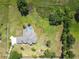Sprawling property with home, pool, and lush surroundings as seen from above at 1109 Colson Rd, Plant City, FL 33567