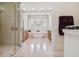 Luxurious bathroom with a walk-in shower and a soaking tub at 1109 Colson Rd, Plant City, FL 33567