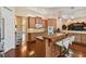 Kitchen with bar seating, granite countertops, wood cabinets, and stainless steel appliances at 1109 Colson Rd, Plant City, FL 33567