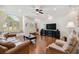 Spacious living room with a large window and comfortable seating area at 1109 Colson Rd, Plant City, FL 33567