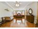 Spacious main bedroom with hardwood floors and a tray ceiling at 1109 Colson Rd, Plant City, FL 33567