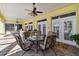Charming outdoor patio with comfortable seating and bright decor, perfect for entertaining next to the pool at 1109 Colson Rd, Plant City, FL 33567
