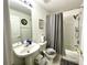 Bathroom featuring a shower and bathtub combination, vanity sink and neutral finishes at 11122 Kempton Vista Dr, Riverview, FL 33579