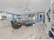 Open-concept living space combining the kitchen, dining, and living areas at 11219 Paddock Manor Ave, Riverview, FL 33569