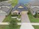 Beautiful aerial view of the home showcasing its well-maintained landscaping and brick driveway at 11308 Chilly Water Ct, Riverview, FL 33569