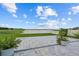 A serene water view extends from this beautiful backyard patio space, ideal for relaxation and outdoor enjoyment at 11308 Chilly Water Ct, Riverview, FL 33569