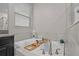 Bright bathroom featuring a luxurious tub with modern fixtures at 11308 Chilly Water Ct, Riverview, FL 33569