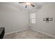 Bedroom with carpet, ceiling fan and a window with blinds at 11308 Chilly Water Ct, Riverview, FL 33569