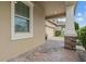 Exterior detail of stone columns and brick driveway leading to the entrance of the home at 11308 Chilly Water Ct, Riverview, FL 33569