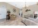 Cozy living room featuring tile floors, comfortable seating, and elegant decorative accents at 11343 Dancing River Dr, Venice, FL 34292