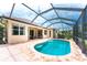 Backyard screened pool and patio area offering a relaxing outdoor space at 11343 Dancing River Dr, Venice, FL 34292