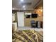 A finished basement offers functional space and a modern aesthetic at 1144 Rushmore Dr, Holiday, FL 34690