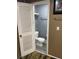 En-suite bathroom featuring a toilet and modern fixtures at 1144 Rushmore Dr, Holiday, FL 34690