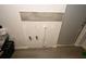 Utility connections are visible on the wall in the unfinished laundry area at 11907 Frontage Rd, Dade City, FL 33525