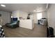 Spacious living area with modern appliances and sleek flooring at 11907 Frontage Rd, Dade City, FL 33525