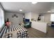 Bright living space with a dining area and a view into the kitchen at 11907 Frontage Rd, Dade City, FL 33525