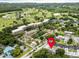 An aerial view of a beautiful community near the water and a golf course at 1250 S Pinellas Ave # 207, Tarpon Springs, FL 34689