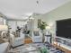 Open living room area featuring stylish furniture, modern decor, and bright, airy space at 1250 S Pinellas Ave # 207, Tarpon Springs, FL 34689