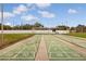 Community shuffleboard courts under shaded covering; a great recreation area at 1250 S Pinellas Ave # 207, Tarpon Springs, FL 34689