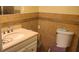 Bathroom featuring a tiled backsplash and modern vanity at 12760 Indian Rocks Rd # 1049, Largo, FL 33774