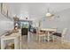 Inviting living and dining area with tile flooring and views of the outdoor scenery at 12760 Indian Rocks Rd # 1049, Largo, FL 33774