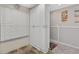 Tall pantry with large cabinets, next to a window with neutral walls at 12760 Indian Rocks Rd # 1049, Largo, FL 33774