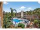 Overhead view of a pool surrounded by Palm Trees at 12760 Indian Rocks Rd # 1049, Largo, FL 33774