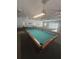 Community billiards room featuring a well-maintained pool table for resident entertainment at 12760 Indian Rocks Rd # 904, Largo, FL 33774