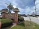 View of the New Atlantis Club entrance sign, commercial buildings and easy access to local amenities at 12760 Indian Rocks Rd # 904, Largo, FL 33774
