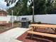 Outdoor grilling area with picnic table, perfect for gatherings and enjoying the beautiful community at 12760 Indian Rocks Rd # 904, Largo, FL 33774