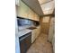 Well-equipped kitchen featuring a dishwasher, microwave, and plenty of cabinet storage at 12760 Indian Rocks Rd # 904, Largo, FL 33774